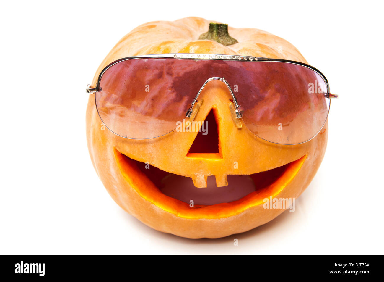 halloween pumpkin with glasses on a white background Stock Photo