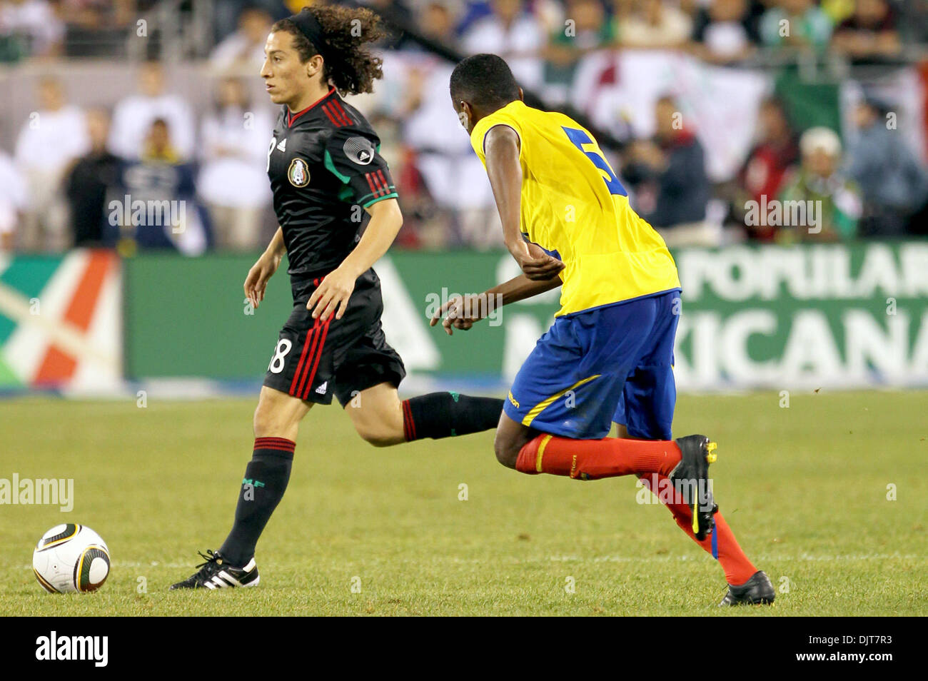 07 May  2010:  Mexico Midfielder Andres Guardado (#18) changes the field with Ecuador Midfielder Oswaldo Minda (#5) approaching. At the end, the game is scoreless  at New Meadowlands Stadium, Rutherford, NJ. (Credit Image: © Anthony Gruppuso/Southcreek Global/ZUMApress.com) Stock Photo