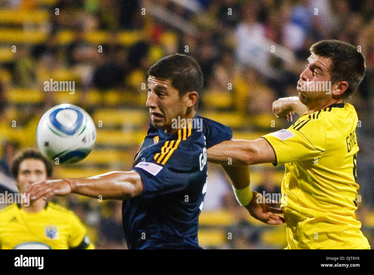 Galaxy defender Omar Gonzolez (#4) and Crew forward Jason Garey (#9) battle for control of the ball during game action.  The LA  Galaxy defeated the Columbus 2-0 at Crew Stadium in Columbus, Ohio. (Credit Image: © Scott Grau/Southcreek Global/ZUMApress.com) Stock Photo
