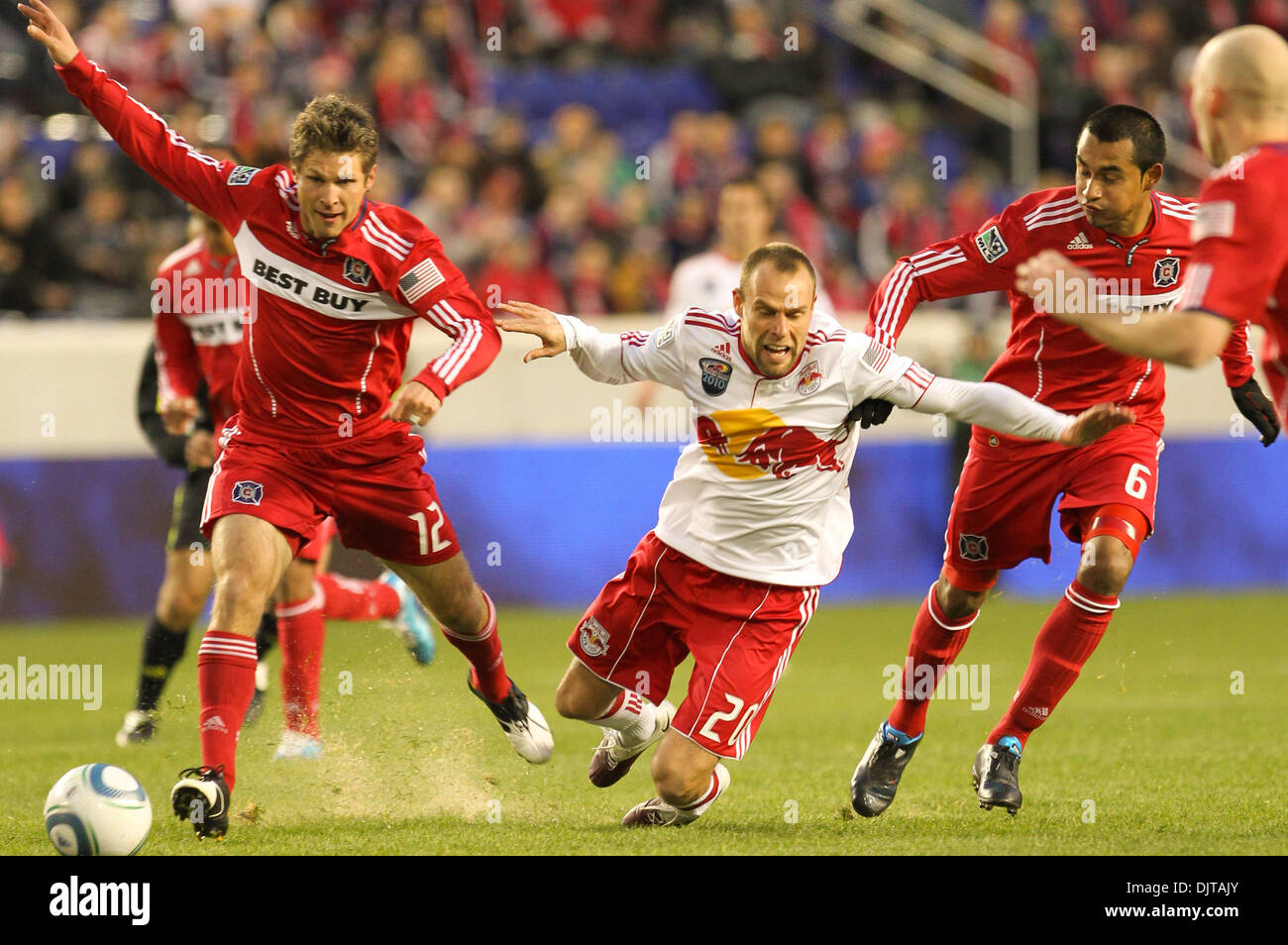 27  March 2010: Red Bulls M Joel Lindpere (#20) looses his balance and the ball to Chicago Fire D Logan Pause (#12).  The Red Bulls defeated Chicago Fire 1-0  in the game held at Red Bull Arena, Harrison, NJ. (Credit Image: © Anthony Gruppuso/Southcreek Global/ZUMApress.com) Stock Photo