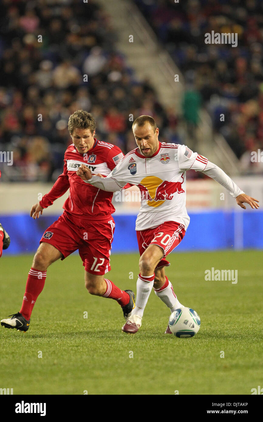 27  March 2010: Red Bulls M Joel Lindpere (#20) and Chicago Fire D Logan Pause (#12) battle for the ball.  The Red Bulls defeated Chicago Fire 1-0  in the game held at Red Bull Arena, Harrison, NJ. (Credit Image: © Anthony Gruppuso/Southcreek Global/ZUMApress.com) Stock Photo