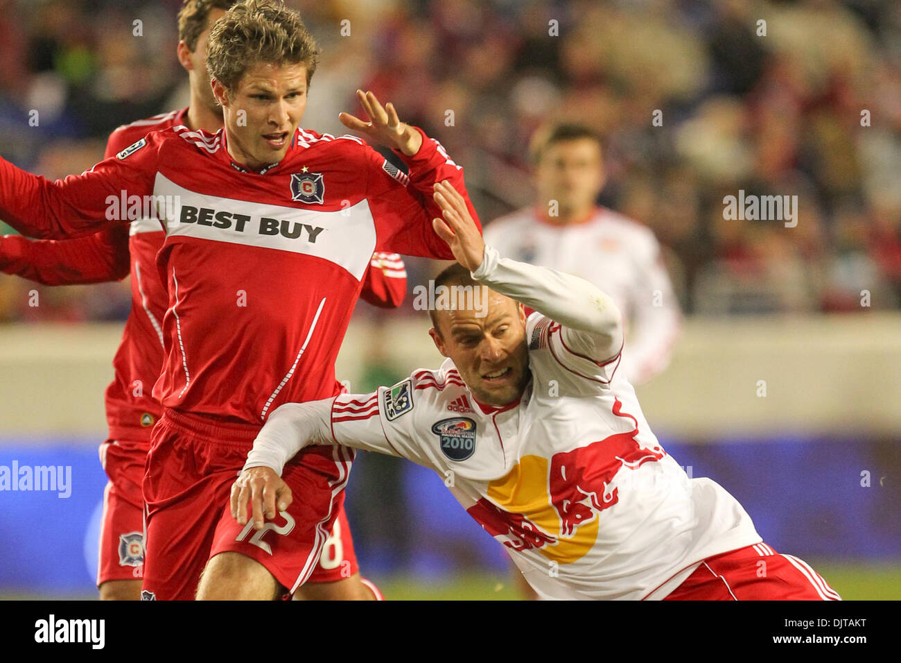 27  March 2010:   Red Bulls M Joel Lindpere (#20) and Chicago Fire D Logan Pause (#12) battle for the ball.The Red Bulls defeated Chicago Fire 1-0  in the game held at Red Bull Arena, Harrison, NJ. (Credit Image: © Anthony Gruppuso/Southcreek Global/ZUMApress.com) Stock Photo