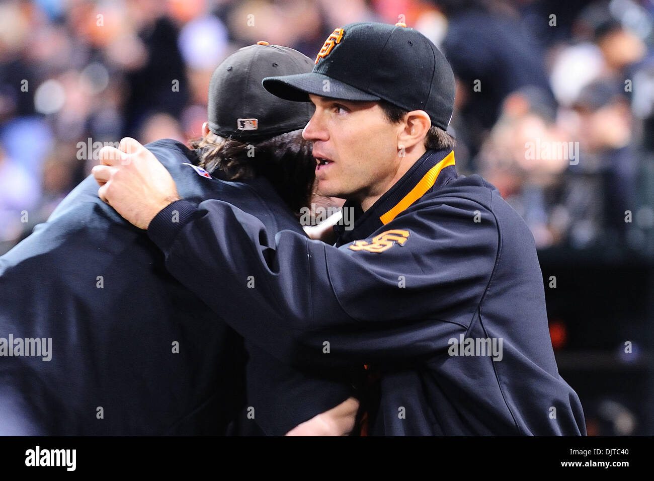 San Francisco, CA: San Francisco Giants' Cy Young award winner Tim Lincecum (55) congratulates game winning pitcher Barry Zito (75) as he enters the pitchers box. The Giants won the game 5-2. (Credit Image: © Charles Herskowitz/Southcreek Global/ZUMApress.com) Stock Photo