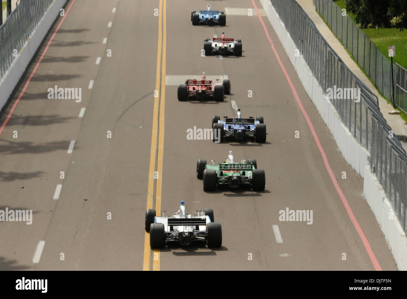 Coming out of a double-yellow flag, the drivers warm up their tires on ...