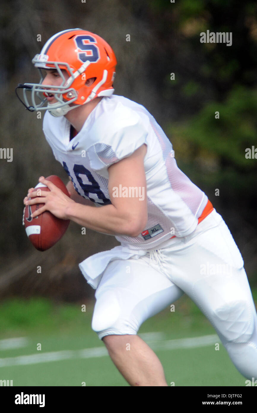 07 2010: Syracuse quarterback Nick Raven (18) rolls to his left during a drill at the Orange football practice at Schwartzwalder-Katz practice fields in Syracuse, NY. (Credit Image: © Michael Johnson/Southcreek Global/ZUMApress.com) Stock Photo