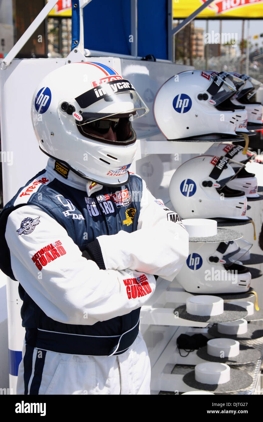 A National Guardsman prepares for a ride in a two seat tandem Indy car
