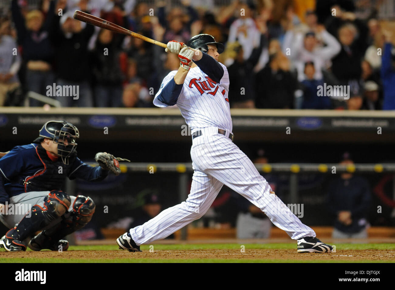 minnesota-twins-first-baseman-justin-morneau-33-makes-a-base-hit-in