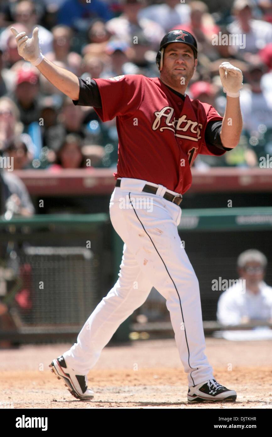 Houston Astros First baseman Lance Berkman (17) loses the grip on his bat  and it goes flying into the stands. The Houston Astros beat the Pittsburgh  Pirates 10 - 3 at Minute