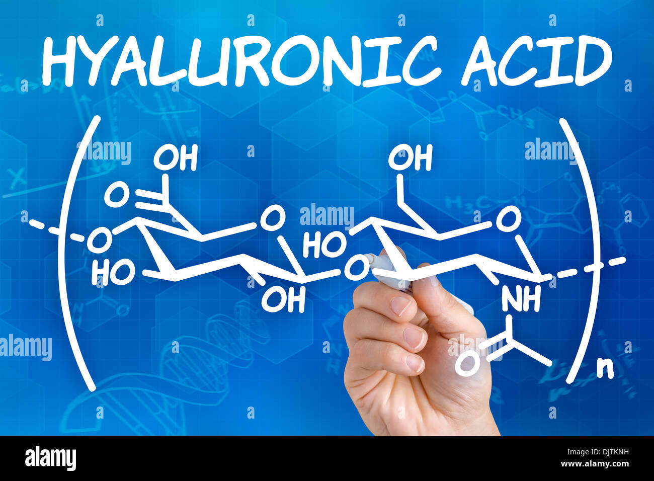 Hand with pen drawing the chemical formula of hyaluronic acid Stock Photo Alamy