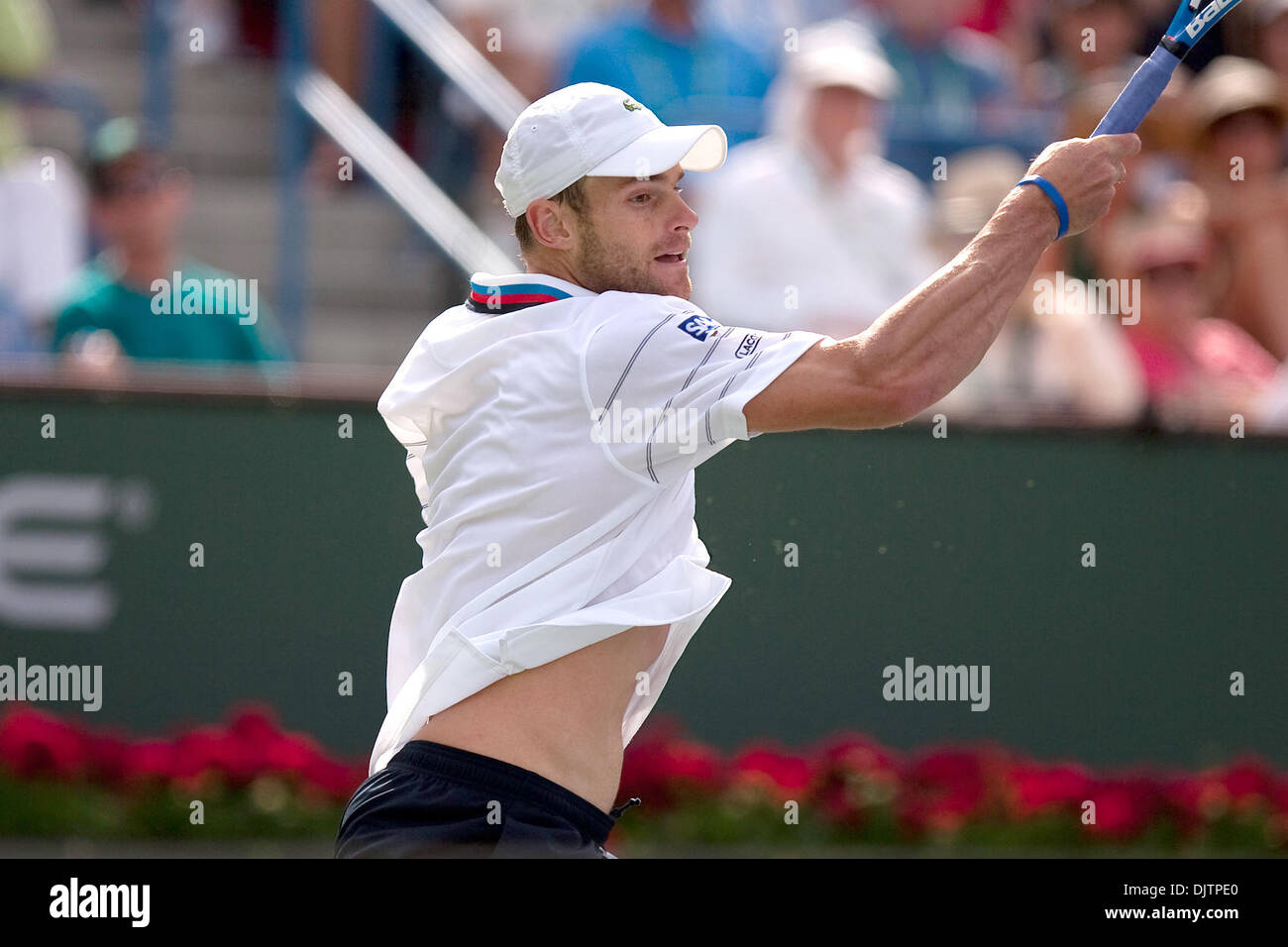 Andy Roddick (USA) returns a shot to Ivan Ljubicic (CRO) at the 2010 ...