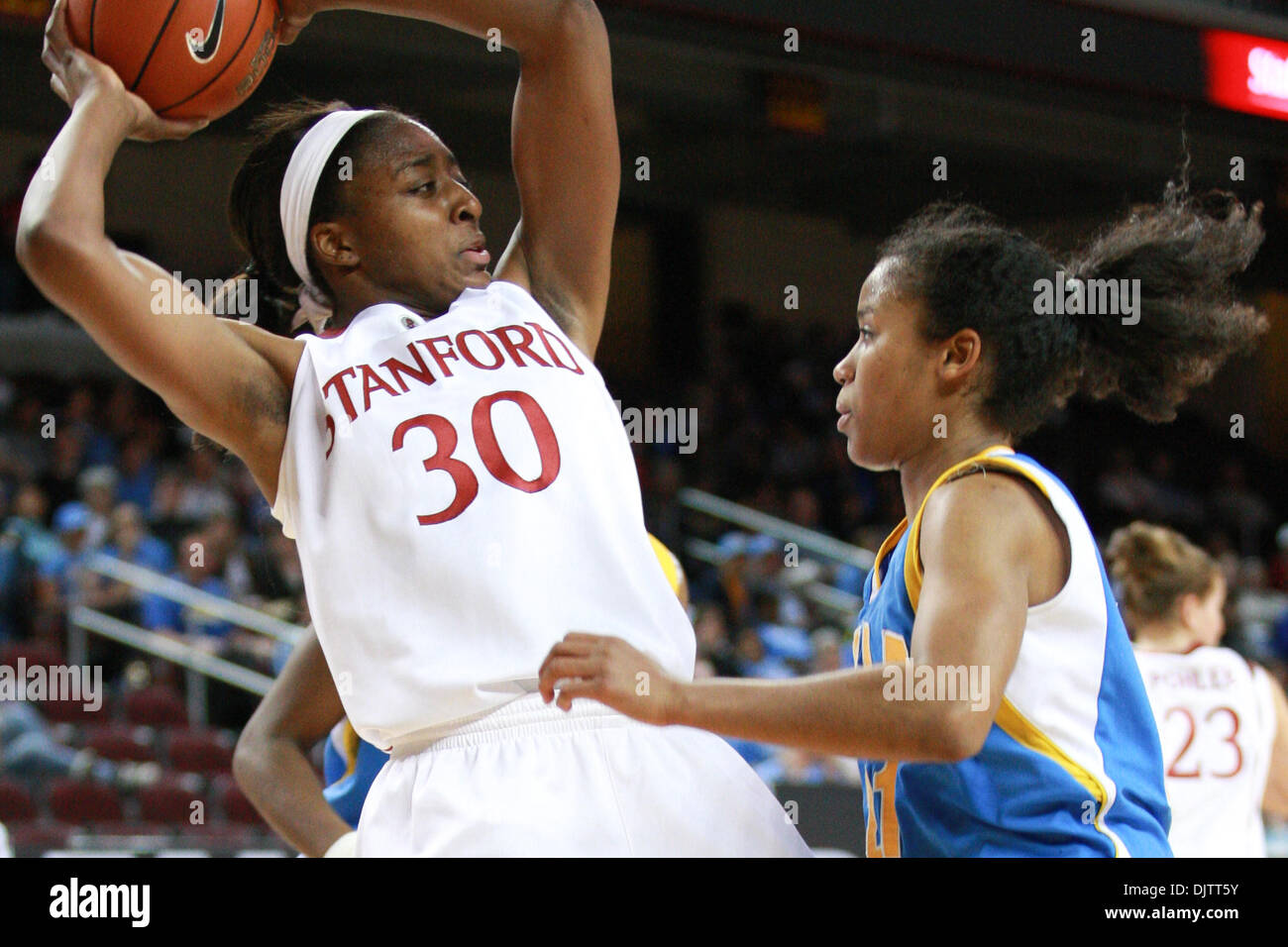 14 March 2010: Nnemkadi Ogwumike #30 looks for an open teammate while being defended by Doreena Campbell during the State Farm Pac-10 Womens Basketball Tournament championship match between Stanford and UCLA at the Galen Center in Los Angeles, California. Stanford defeated UCLA with ease, the final score was 70-46.  Mandatory Credit: Brandon Parry / Southcreek Global (Credit Image: Stock Photo