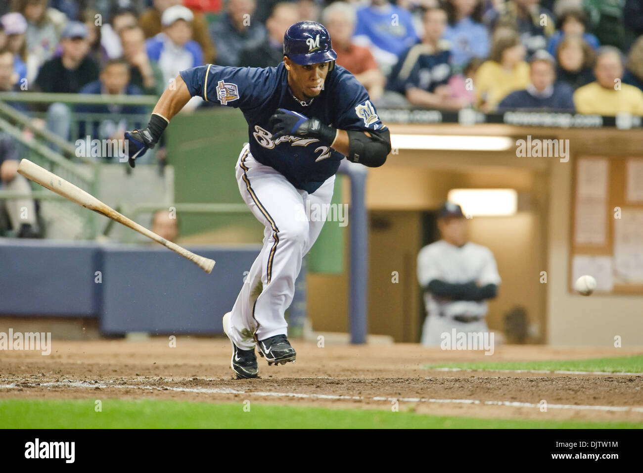 Milwaukee Brewers center fielder Carlos Gomez (27) lays down a bunt during  the game between the Colorado Rockies and Milwaukee Brewers at Miller Park  in Milwaukee. The Brewers won 7-5. (Credit Image: ©