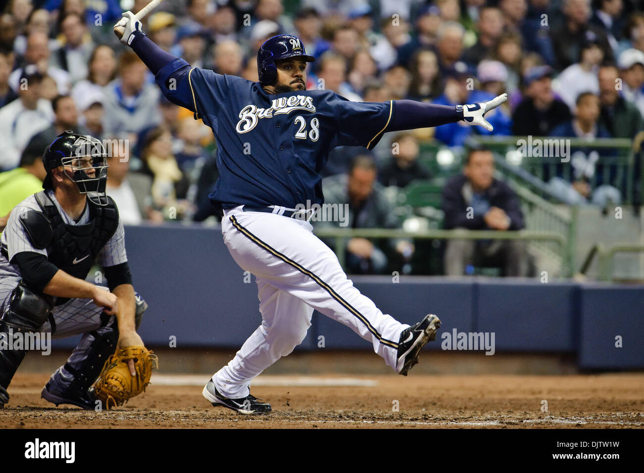 Milwaukee Brewers first baseman Prince Fielder (28) hits a double down the  first base line during the game between the Colorado Rockies and Milwaukee  Brewers at Miller Park in Milwaukee. The Brewers