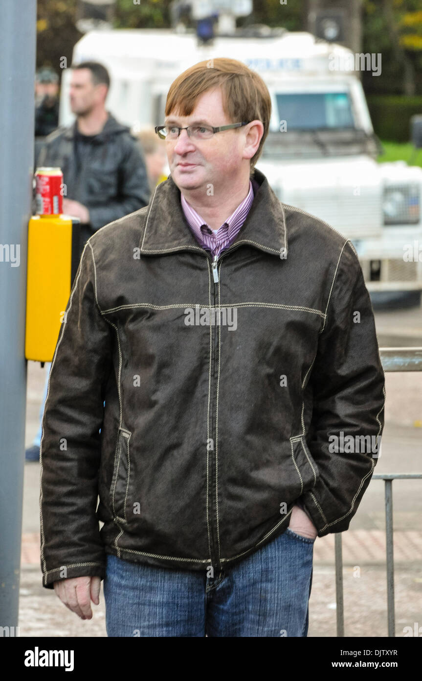 Belfast, Northern Ireland - 30th Nov 2013 - Protestant Coalition member Willie Frazer watches as a loyalist parade passes peacefully. Credit:  Stephen Barnes/Alamy Live News Stock Photo
