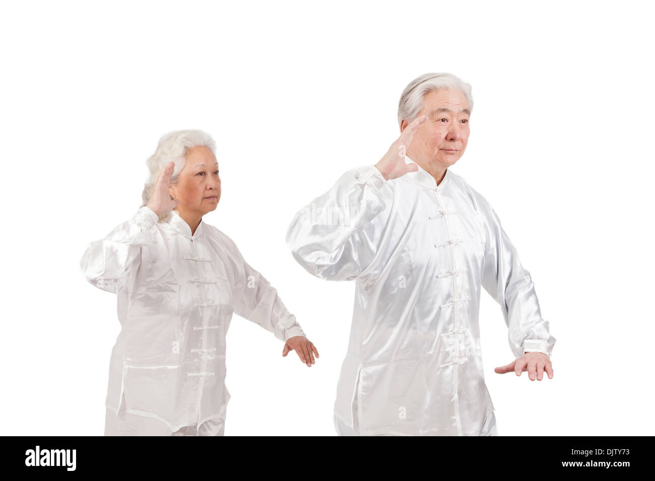 Two senior people doing Tai Chi Stock Photo