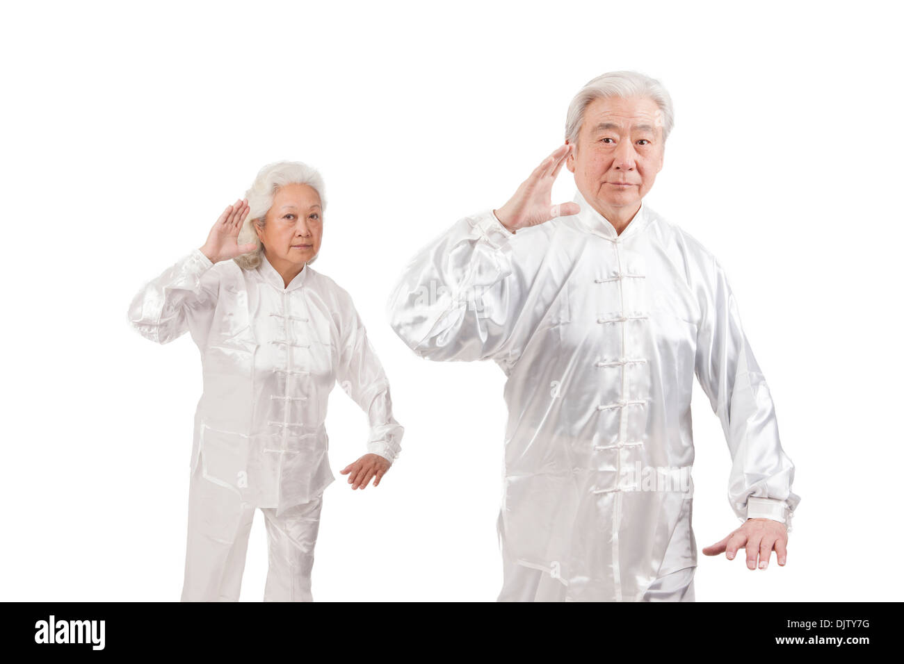 Two senior people doing Tai Chi Stock Photo