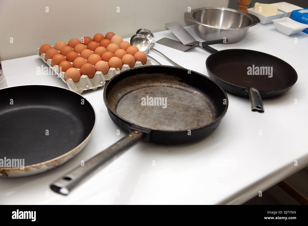 Frying pan and eggs in the kitchens of Bodegas Campo Viejo winery La Rioja Spain Stock Photo