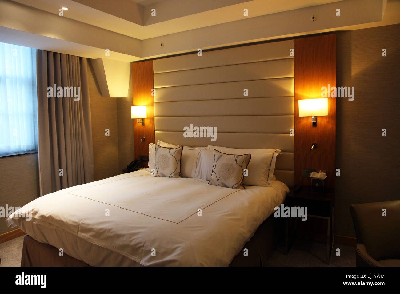 Bedroom in Intercontinental Westminster Hotel, Broadway, London UK Stock Photo