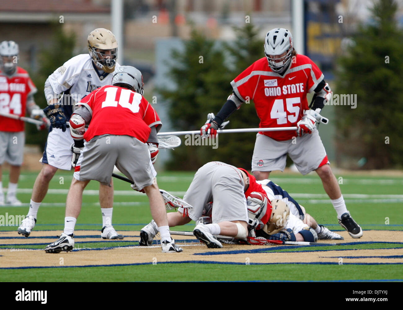 Overtime faceoff in game action between the Notre Dame Fighting Irish
