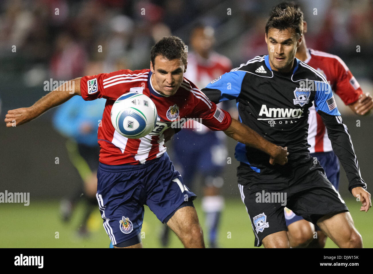 24 April 2010: Chivas USA defenseman #13 Jonathan Bornstein (L) and San Jose Earthquake forward #8 Chris Wondolowski (R) fight for the ball during the Chivas USA vs the San Jose Earthquakes game at the Home Depot Center in Carson, California. Chivas went on to defeat the Earthquakes with a final score of 3-2. Mandatory Credit: Brandon Parry / Southcreek Global (Credit Image: © Bran Stock Photo