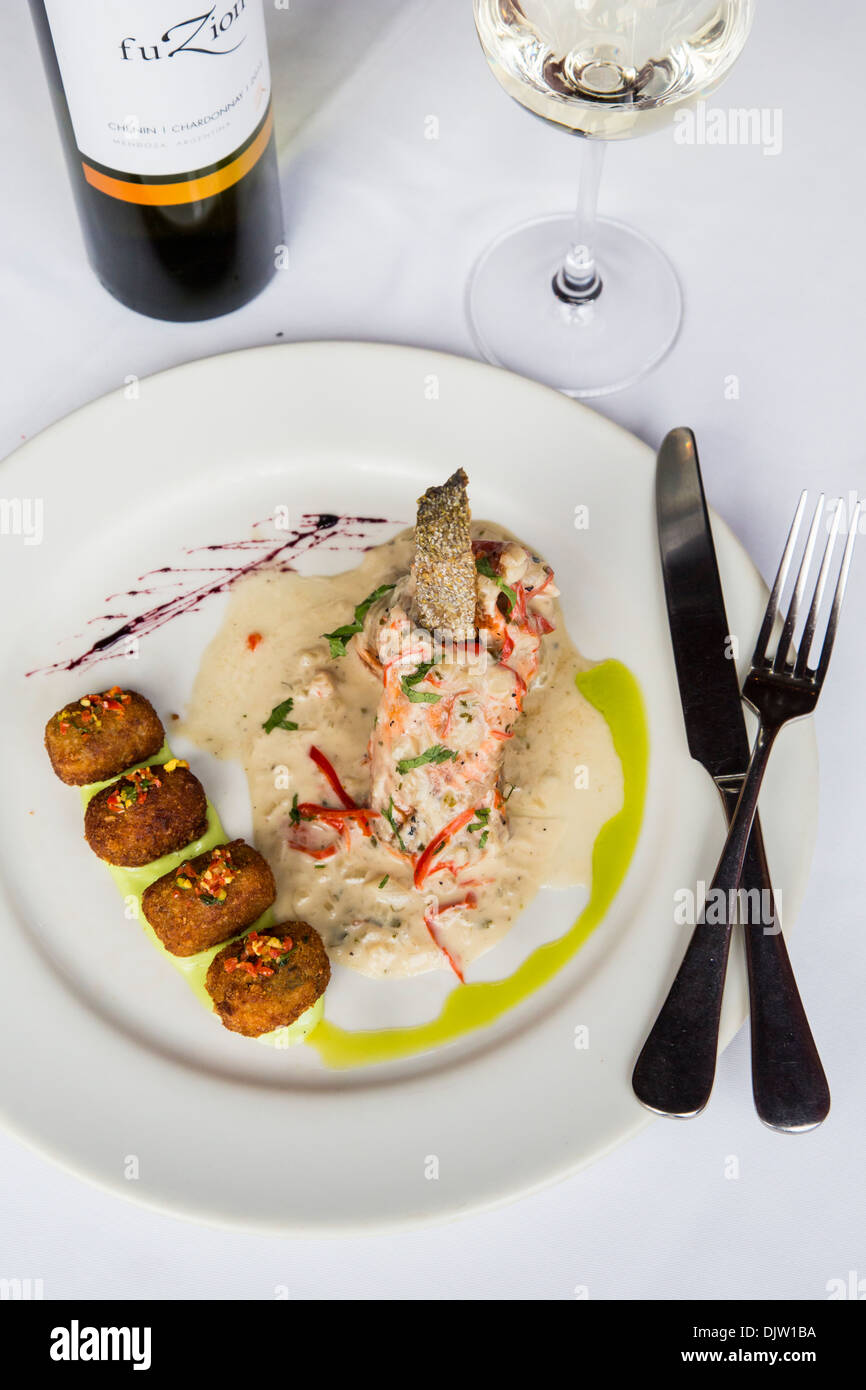 Red trout with fragrant coconut milk & coriander leaf salsa at