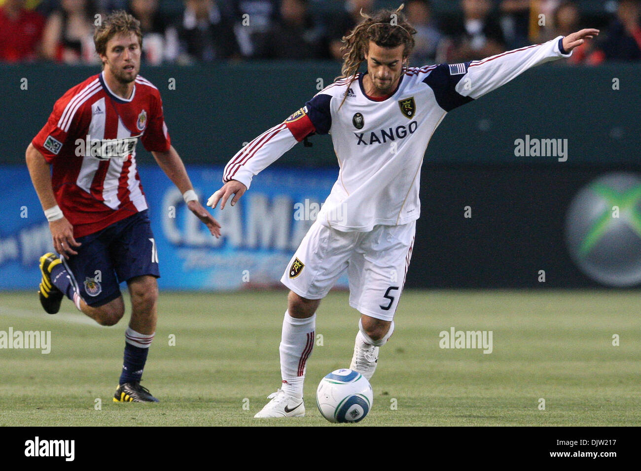 22 May 2010: Real Salt Lake M #5 Kyle Beckerman (R) controls and passes the ball while being pressured by Chivas USA M #18 Blair Gavin (L) during the Chivas USA vs the Real Salt Lake game at the Home Depot Center in Carson, California. Real Salt Lake went on to defeat Chivas USA with a final score of 2-1. Mandatory Credit: Brandon Parry / Southcreek Global (Credit Image: © Brandon  Stock Photo