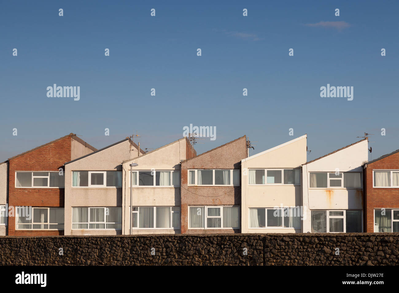 Houses behind the sea wall at Cleveleys in Lancashire Stock Photo