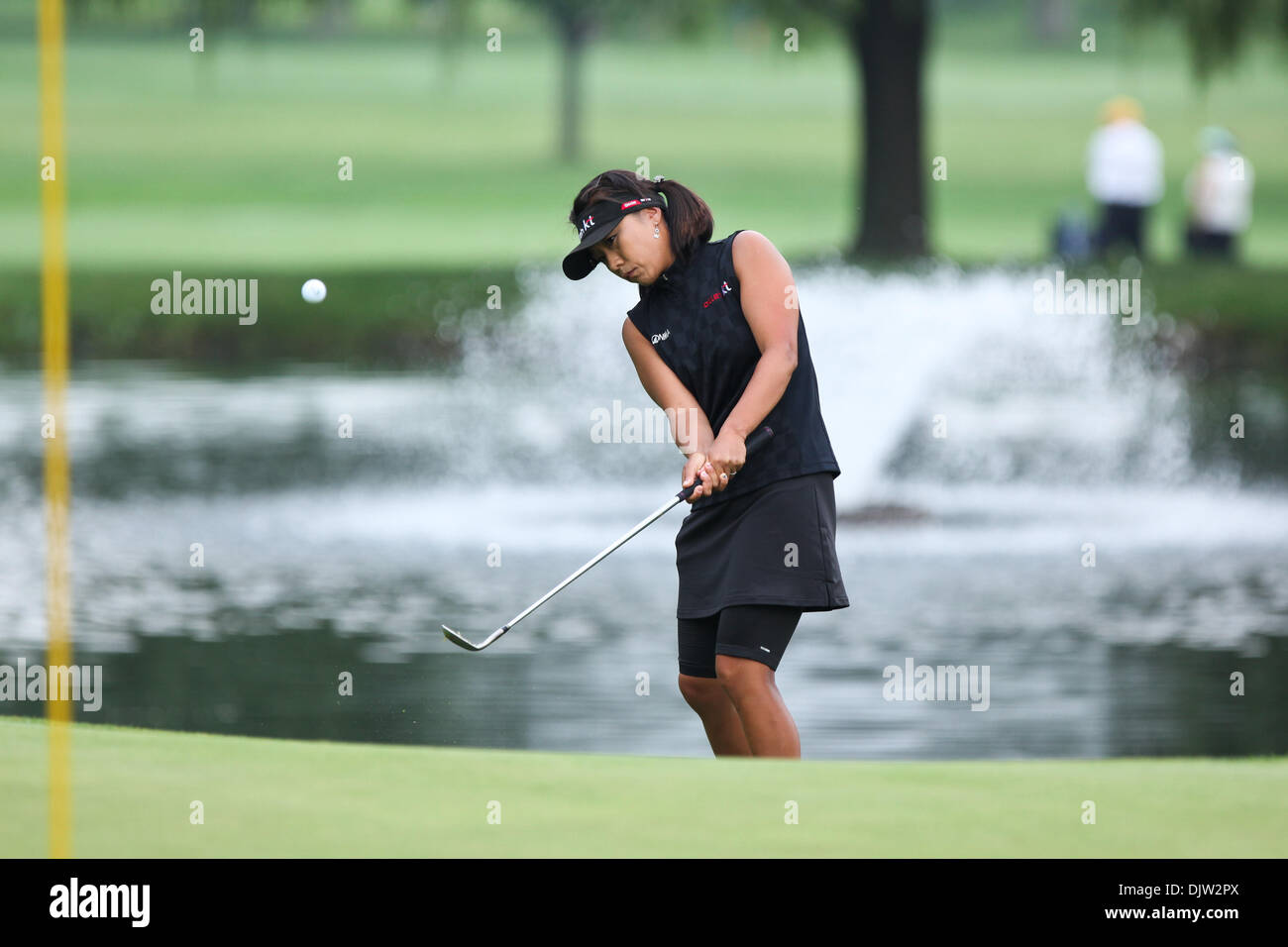 Mi Hyun Kim of South Korea chipped her ball onto the 2nd green during ...