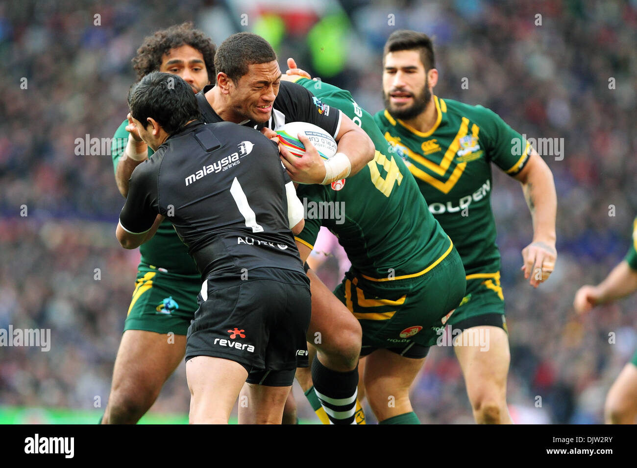 Manchester, UK. 30th Nov, 2013. Jarresyd Hayne (Australia &amp; Parramatta Eels) makes a crunching tackle during the Rugby League World Cup Final between New Zealand and Australia at Old Trafford Manchester. Credit:  Action Plus Sports/Alamy Live News Stock Photo