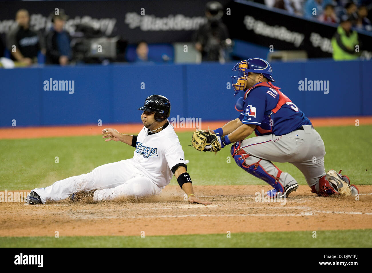 Toronto Blue Jays Alex Gonzalez 11 is caught out at home plate in the