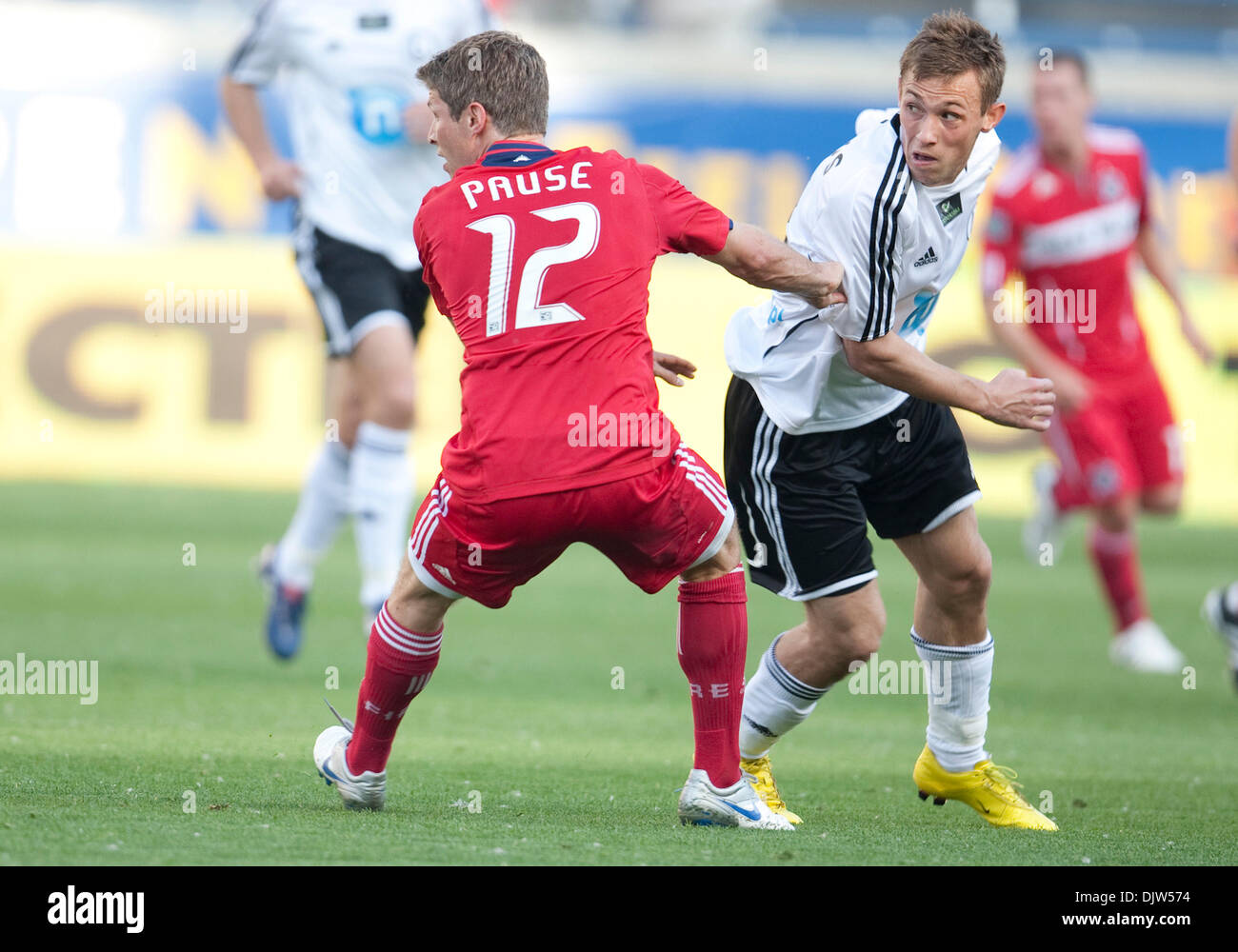 Legia Warsaw Midfielder Maciej Rybus (#31) and Chicago Fire Defenseman Logan Pause (#12) in game action between Legia Warsaw and the Chicago Fire at Toyota Park in Bridgeview, Illinois.  Legia Warsaw defeated the Chicago Fire 3-0. (Credit Image: © John Mersits/Southcreek Global/ZUMApress.com) Stock Photo