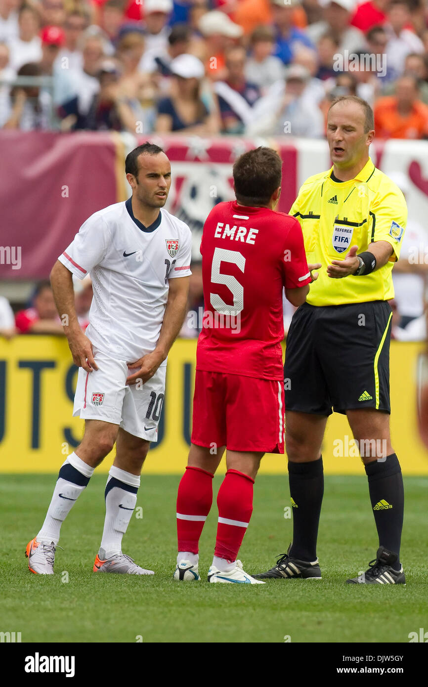 Turkey mid-fielder Emre Belozoglu (5) arguing with Referee Silviu ...