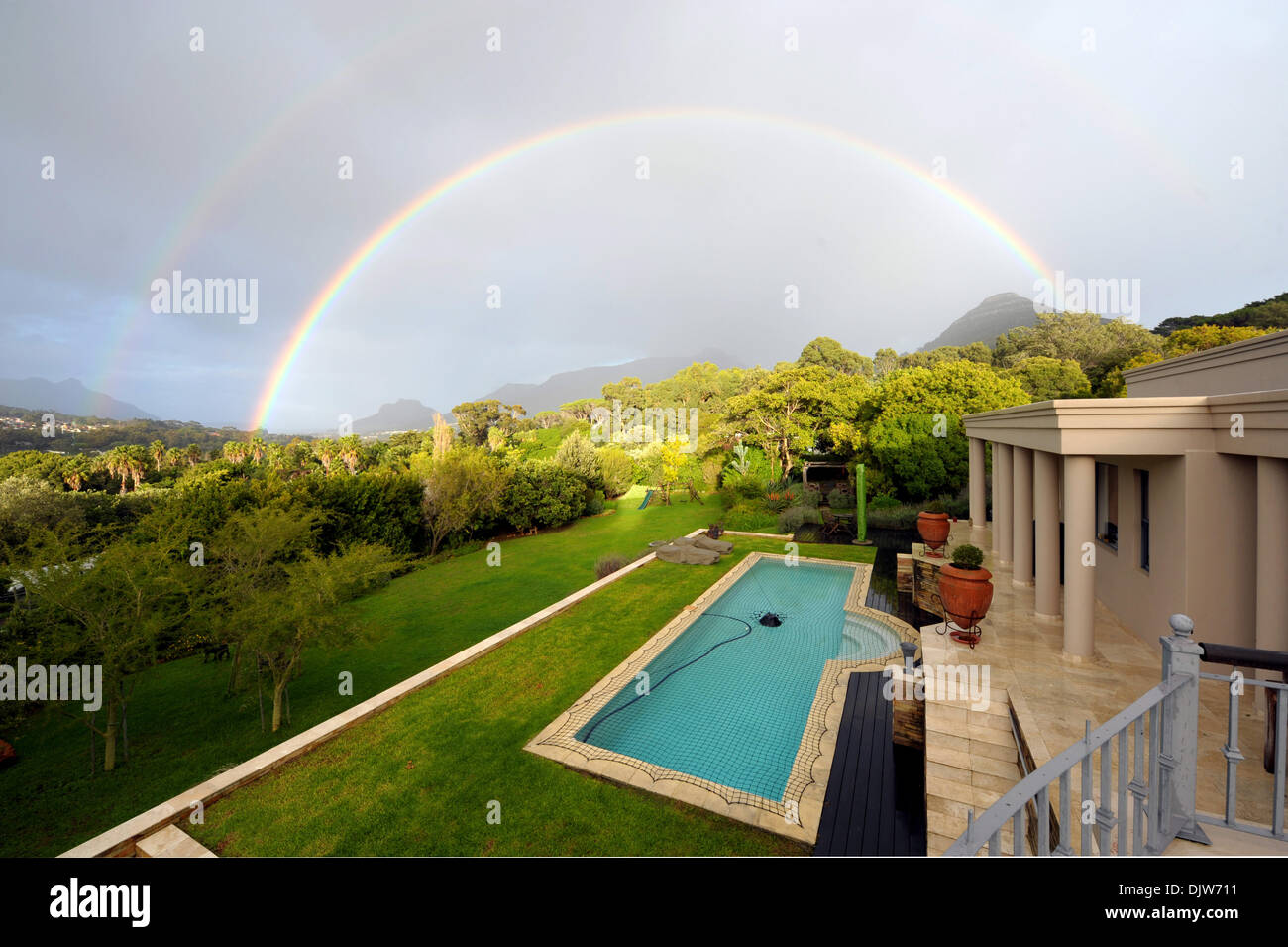 A colourful rainbow in Hout Bay near by Cape Town, South Africa, 09 June 2012. Photo: Ralf Hirschberger Stock Photo