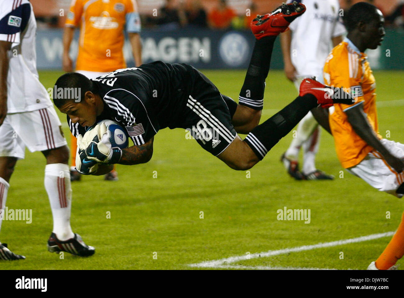 Nick Rimando (#18) for the Real Salt Lake snatches the ball and leaps over the Houston Dynamo.  With two back to back penalty kicks in the second half, the Houston Dynamo defeated Real Salt Lake 2-1 at Robertson Stadium in Houston, TX. (Credit Image: © Anthony Vasser/Southcreek Global/ZUMApress.com) Stock Photo