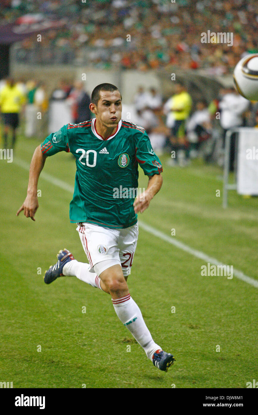 Jorge Torres Nilo (#20) Defender for Mexico chases a high pass deep in Angola territory.  Mexico defeated Angola 1-0 at Reliant Stadium in Houston, TX. (Credit Image: © Anthony Vasser/Southcreek Global/ZUMApress.com) Stock Photo