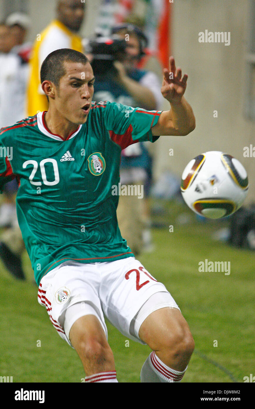 Jorge Torres Nilo (#20) Defender for Mexico controls a high ball deep in Angola territory.  Mexico defeated Angola 1-0 at Reliant Stadium in Houston, TX. (Credit Image: © Anthony Vasser/Southcreek Global/ZUMApress.com) Stock Photo