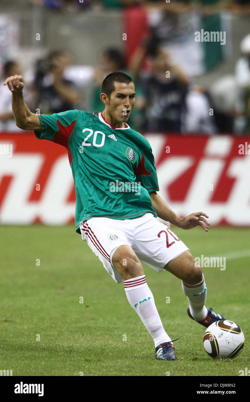 Jorge Torres Nilo (#20) Defender for Mexico chips the ball upfield.  Mexico defeated Angola 1-0 at Reliant Stadium in Houston, TX. (Credit Image: © Anthony Vasser/Southcreek Global/ZUMApress.com) Stock Photo