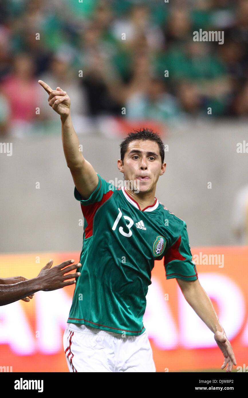 Paul Aguilar (#13) Defender for Mexico calls for the ball on a corner kick.  Mexico defeated Angola 1-0 at Reliant Stadium in Houston, TX. (Credit Image: © Anthony Vasser/Southcreek Global/ZUMApress.com) Stock Photo