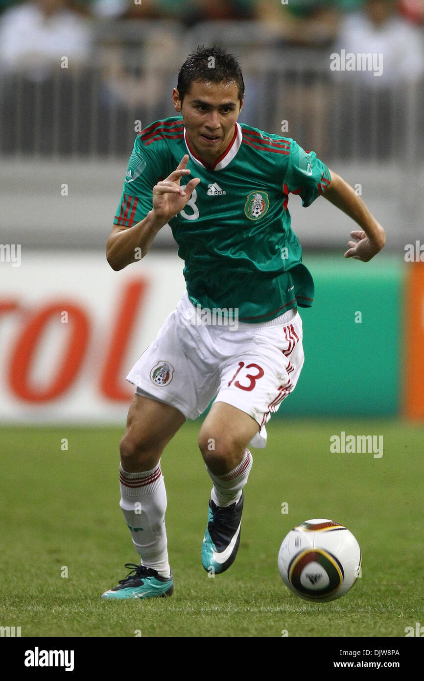 Paul Aguilar (#13) Defender for Mexico dribbles the ball in open space.  Mexico defeated Angola 1-0 at Reliant Stadium in Houston, TX. (Credit Image: © Anthony Vasser/Southcreek Global/ZUMApress.com) Stock Photo