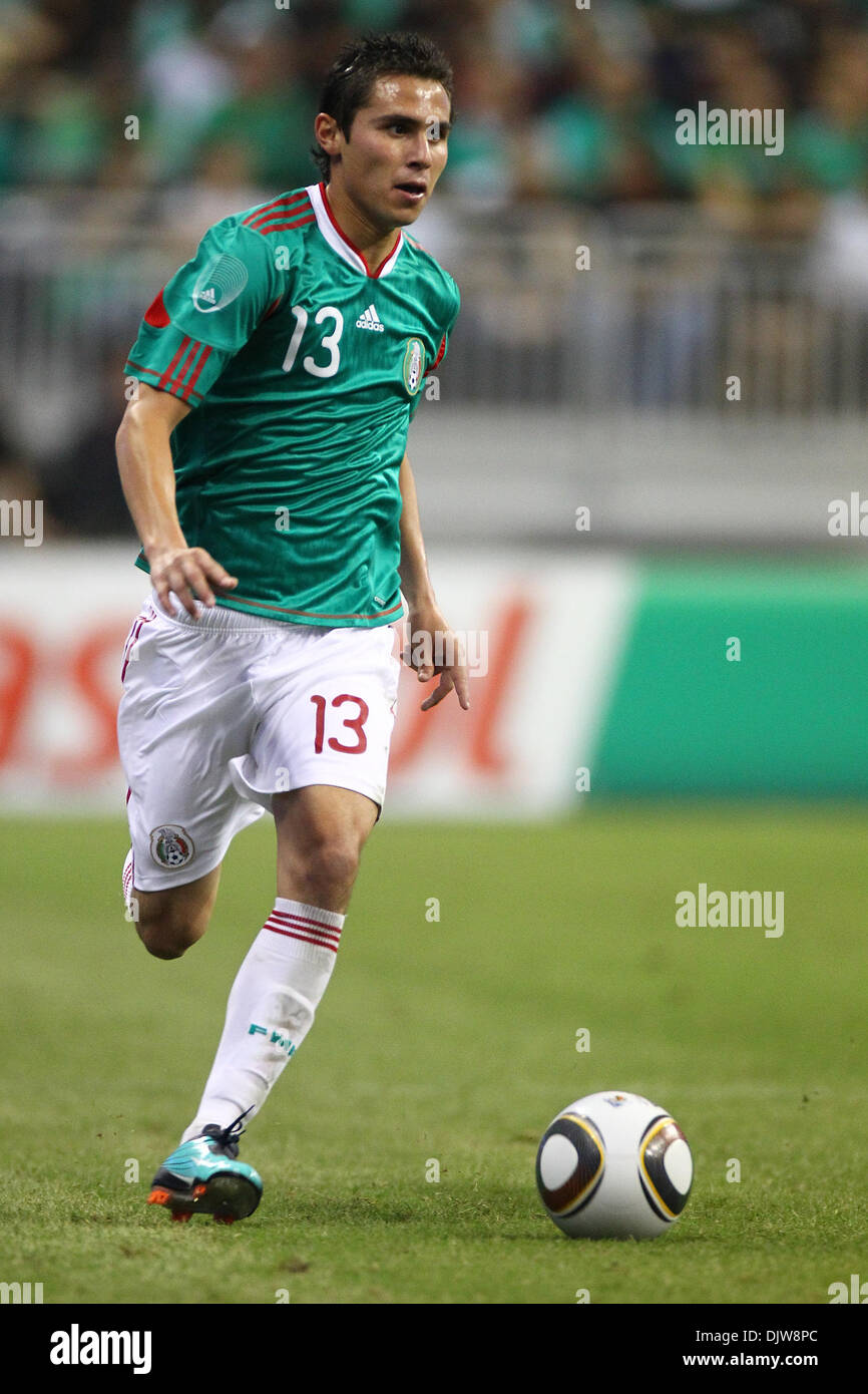 Paul Aguilar (#13) Defender for Mexico dribbles the ball in open space.  Mexico defeated Angola 1-0 at Reliant Stadium in Houston, TX. (Credit Image: © Anthony Vasser/Southcreek Global/ZUMApress.com) Stock Photo