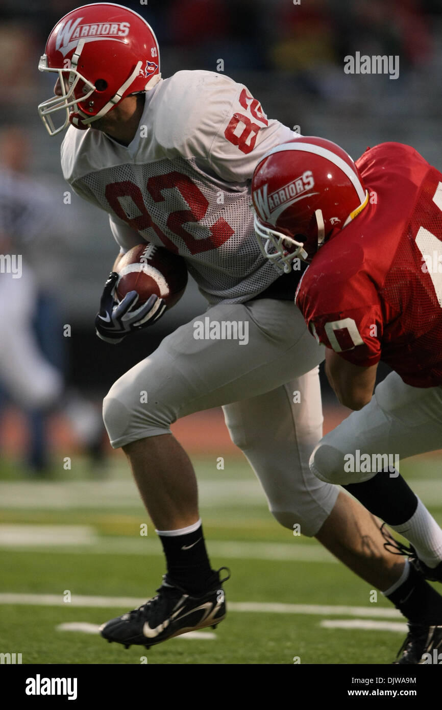 Apr. 17, 2010 - East Stroudsburg, Pennsylvania, U.S - 17 April 2010; East Stroudsburg, Pennsylvania:  East Stroudsburg receiver Robert Bleiler (82) is tackled by linebacker Thomas Chesko (40) during the game action of the 2010 Spring Game played at Eiler-Martin Stadium in East Stroudsburg, Pennsylvania.  .Mandatory Credit: Alan Maglaque / Southcreek Global (Credit Image: © Southcre Stock Photo