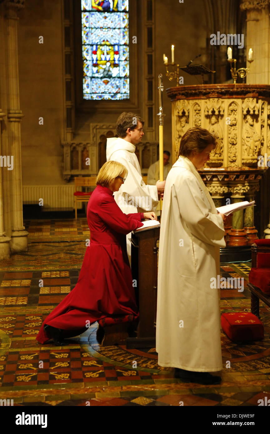 Dublin, Ireland. 30th November 2013. The bishop-elect the Revd Pat Storey kneels at the beginning of the Rite of Ordination. The Most Revd Pat Storey has been consecrated as Church of Ireland Bishop of Meath and Kildare in Dublin's Christ Church Cathedral. Credit:  Michael Debets/Alamy Live News Stock Photo
