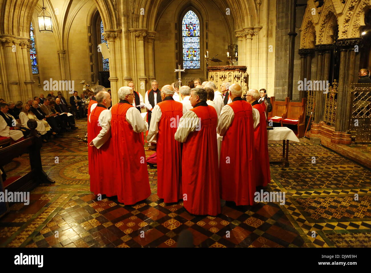 Dublin, Ireland. 30th November 2013. The attending bishops surround the bishop-elect the Revd Pat Storey and the consecrating Bishops. The Most Revd Pat Storey has been consecrated as Church of Ireland Bishop of Meath and Kildare in Dublin's Christ Church Cathedral. Credit:  Michael Debets/Alamy Live News Stock Photo