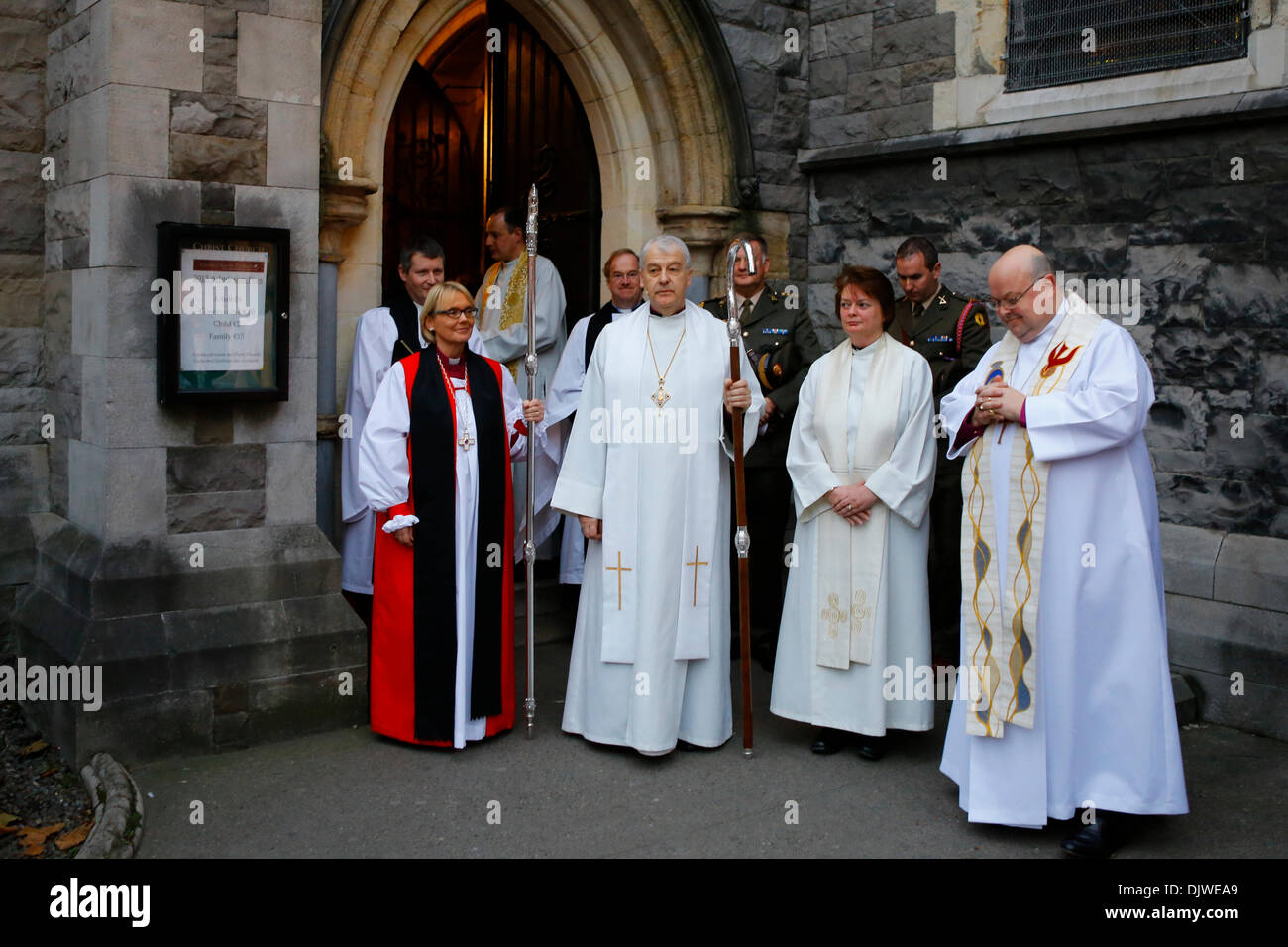 Dublin, Ireland. 30th November 2013. The Bishop of Meath and Kildare the Most Revd Pat Storey (L) is pictured with the Archbishop of Dublin, the Most Revd Dr Michael Jackson (2 L) and the Bishop of Cork, Cloyne and Ross, The Right Revd Paul Colton (R) outside Christ Church Cathedral. The Most Revd Pat Storey has been consecrated as Church of Ireland Bishop of Meath and Kildare in Dublin's Christ Church Cathedral. Credit:  Michael Debets/Alamy Live News Stock Photo