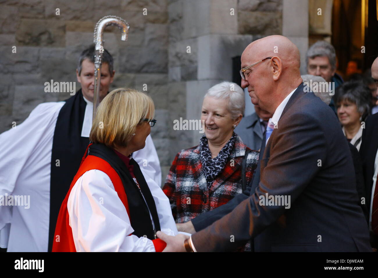 Dublin, Ireland. 30th November 2013. The Bishop of Meath and Kildare the Most Revd Pat Storey (L), receives well wishes from a member of the congregation. The Most Revd Pat Storey has been consecrated as Church of Ireland Bishop of Meath and Kildare in Dublin's Christ Church Cathedral. Credit:  Michael Debets/Alamy Live News Stock Photo