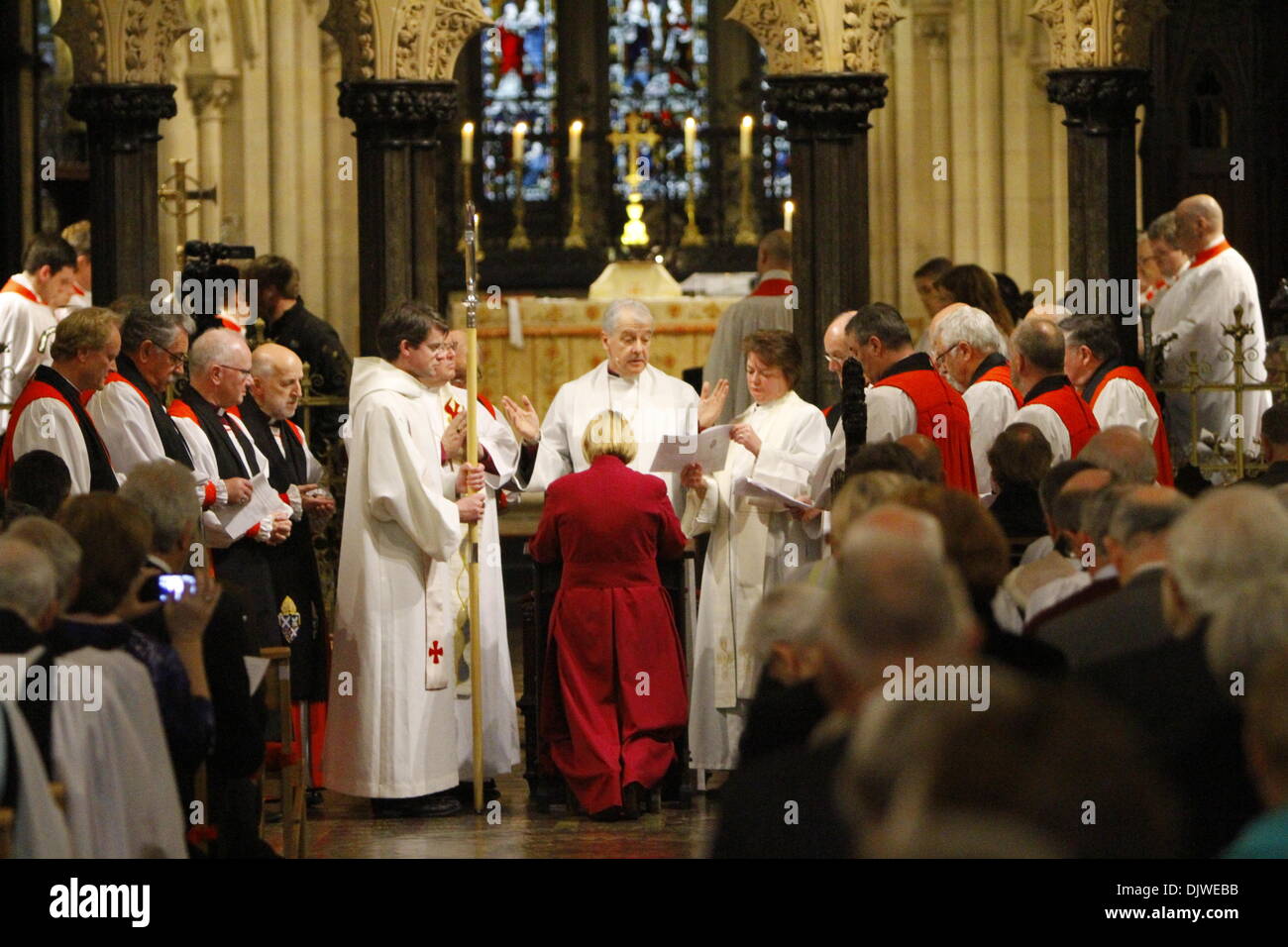 Dublin, Ireland. 30th November 2013. The bishop-elect, the Revd Pat Storey, kneels before the three consecrating bishops (The bishop of Derry and Raphoe, the Archbishop of Dublin and the Bishop of Cork, Cloyne and Ross) and the other attending bishops. The Most Revd Pat Storey has been consecrated as Church of Ireland Bishop of Meath and Kildare in Dublin's Christ Church Cathedral. Credit:  Michael Debets/Alamy Live News Stock Photo