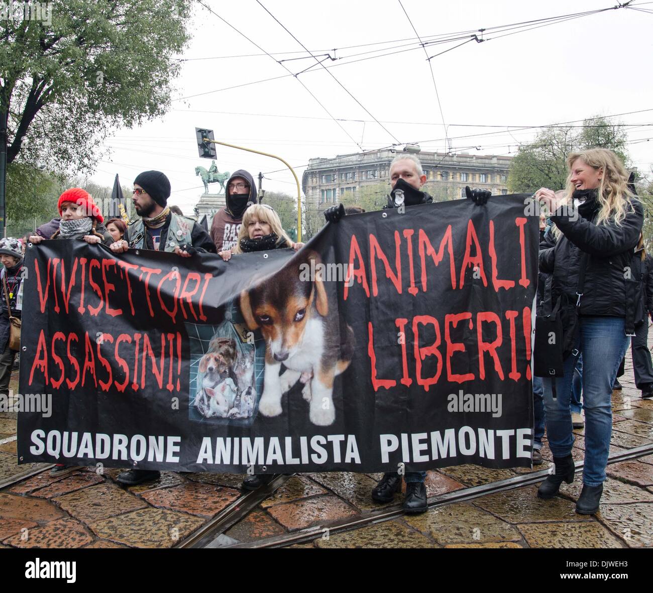 Milan, Italy. 30th Nov, 2013. Animal rights activists protest in Milan against vivisection. Activists say no to the use of animals in scientific experiments. Milan, November 30, 2013.Photo: Marco Aprile/NurPhoto Credit:  Marco Aprile/NurPhoto/ZUMAPRESS.com/Alamy Live News Stock Photo