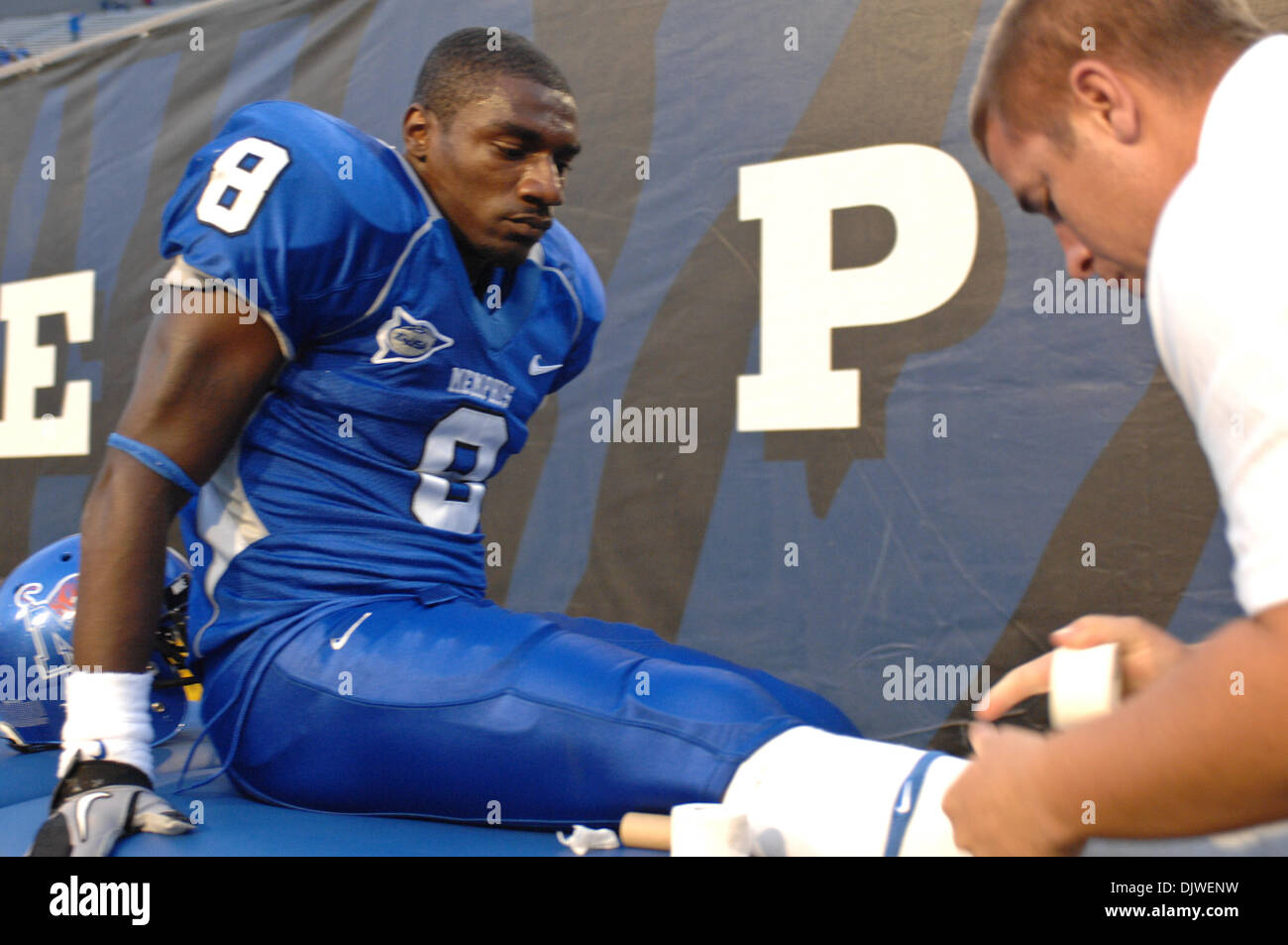 Oct. 2, 2010 - Memphis, Tennessee, United States of America - Memphis Tigers cornerback Torenzo Quinn (8) gets taped up during the NCAA regular season game between the Tulsa Golden Hurricane at Memphis Tigers at the Liberty Bowl Memorial Stadium. Tulsa Golden Hurricane defeats the Memphis Tigers 48 - 7 Final. (Credit Image: © Danny Reise/Southcreek Global/ZUMApress.com) Stock Photo