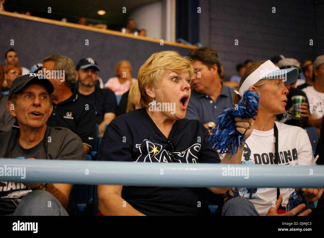 Oct. 7, 2010 - St. Petersburg - CHRIS ZUPPA   |   Times.SP 329225 ZUPP Rays 13.(St. Petersburg, 10/07/2010) (left to right) Tampa Bay Rays fans Frank Casorio of St. Pete Beach, his wife, Dianne Casorio of St. Pete Beach and her friend, Debbie Haynes of Gulfport react to the end of the sixth inning. Tampa Bay Rays play the Texas Rangers for game two of the ALDS at Tropicana Field. [ Stock Photo