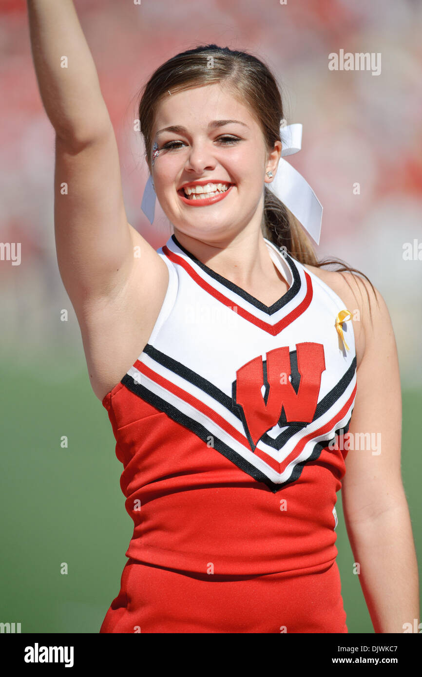 Oct. 09, 2010 - Madison, Wisconsin, United States of America - A Wisconsin cheerleader performs during the game between the Minnesota Golden Gophers and the Wisconsin Badgers at Camp Randall Stadium, Madison, Wisconsin.  Wisconsin defeated Minnesota 41-23. (Credit Image: © John Rowland/Southcreek Global/ZUMApress.com) Stock Photo